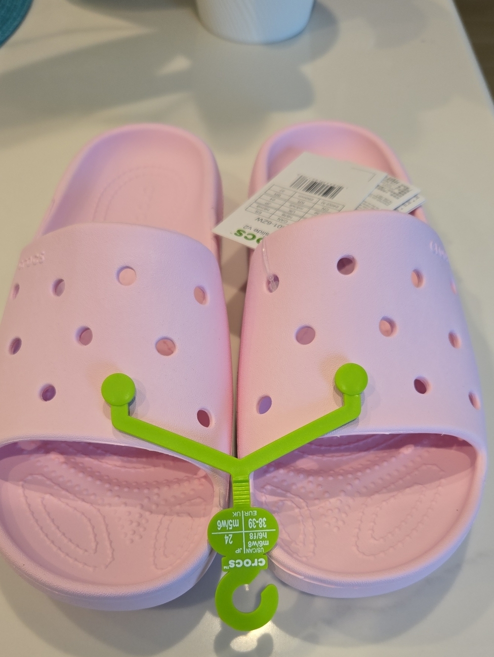 CROCS Slide Sandals in Light Pink